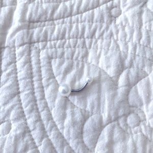 Surgical steel naval jewelry with pearl accents